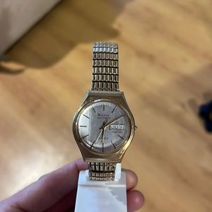 Bulova Gold Tone Men’s Watch with Silver Dial and Day-Date Window